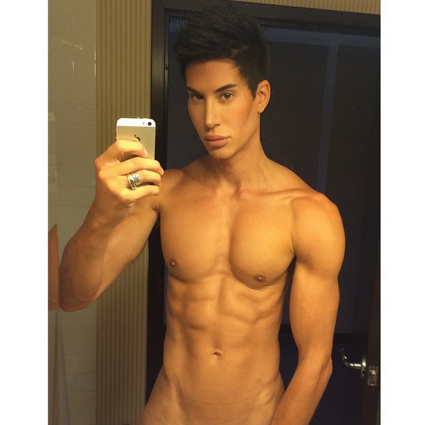 Human Ken Doll with no top on